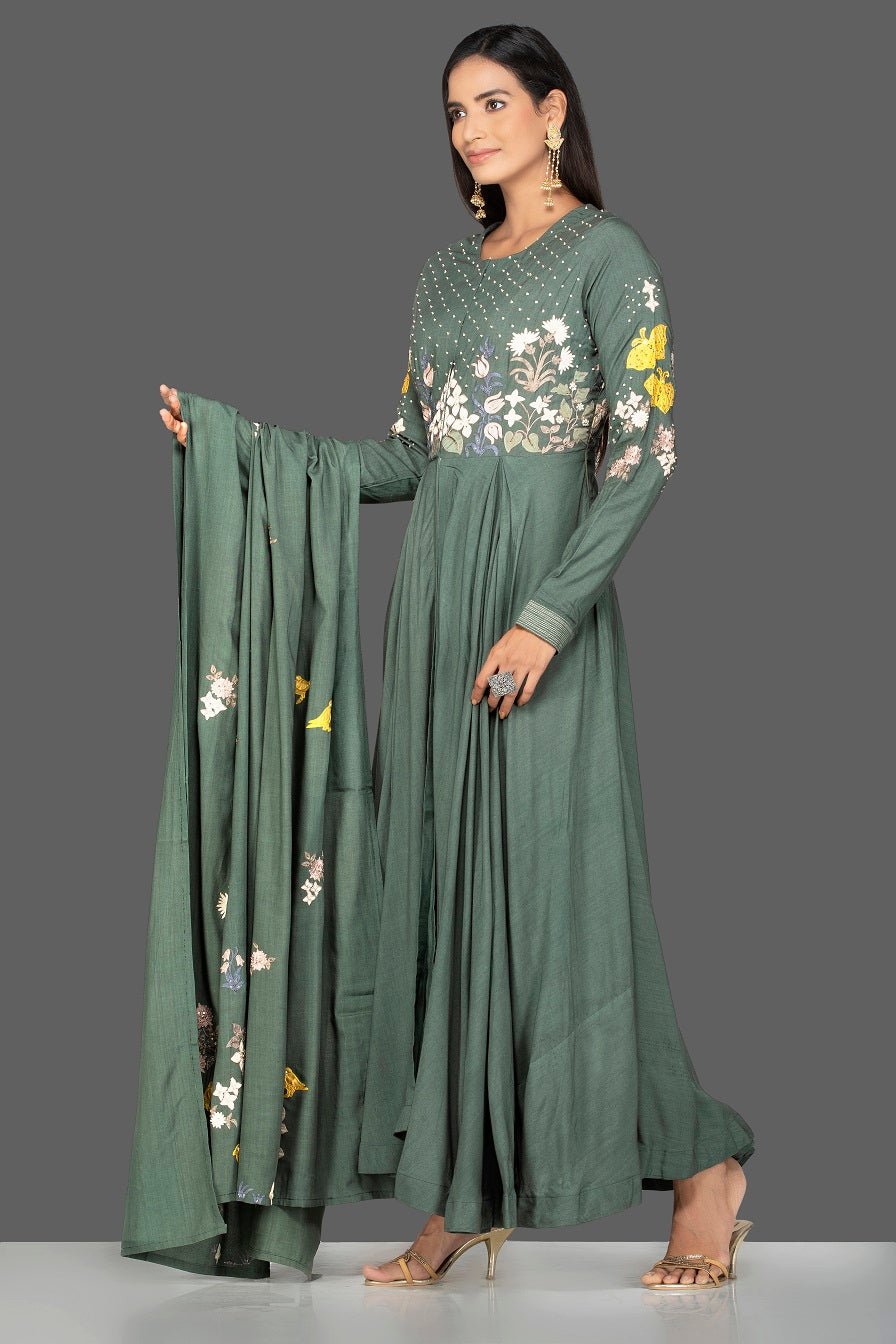 Shop beautiful green modal silk resham embroidery Anarkali online in USA with dupatta. Go for an extraordinary traditional look with splendid designer Anarkali suits. salwar suits from Pure Elegance from Indian boutique in USA.  Shop online or visit our store now.-side