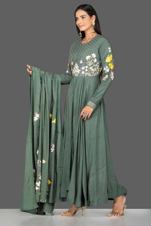 Shop beautiful green modal silk resham embroidery Anarkali online in USA with dupatta. Go for an extraordinary traditional look with splendid designer Anarkali suits. salwar suits from Pure Elegance from Indian boutique in USA.  Shop online or visit our store now.-side