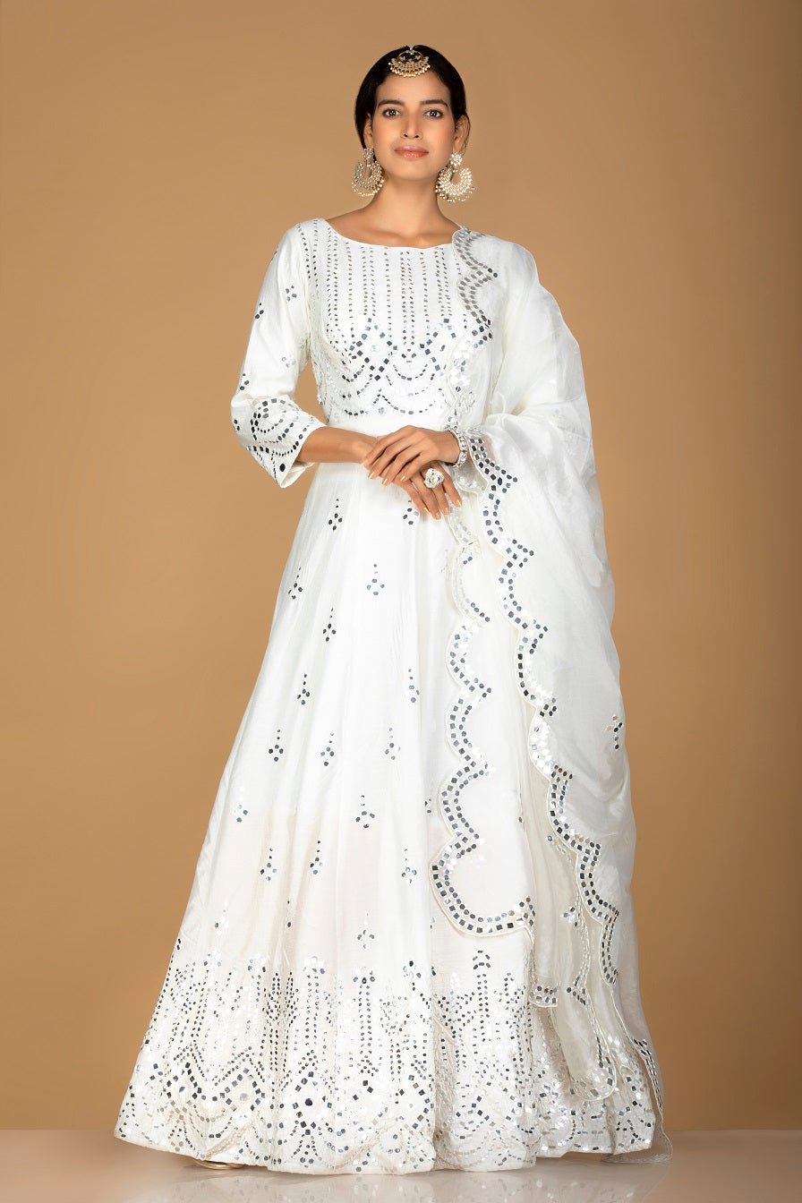 Buy gorgeous white mirror work chanderi silk Anarkali online in USA. Turn heads at weddings and festive occasions with exquiste Indian women designer clothes from Pure Elegance Indian fashion store in USA. Shop now.-full view