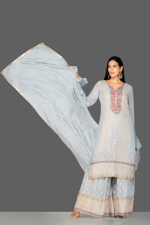 Buy powder blue embroidered georgette palazzo suit online in USA with dupatta. Turn heads at weddings and festive occasions with exquisite Indian women designer clothes from Pure Elegance Indian fashion store in USA. Shop now.-front