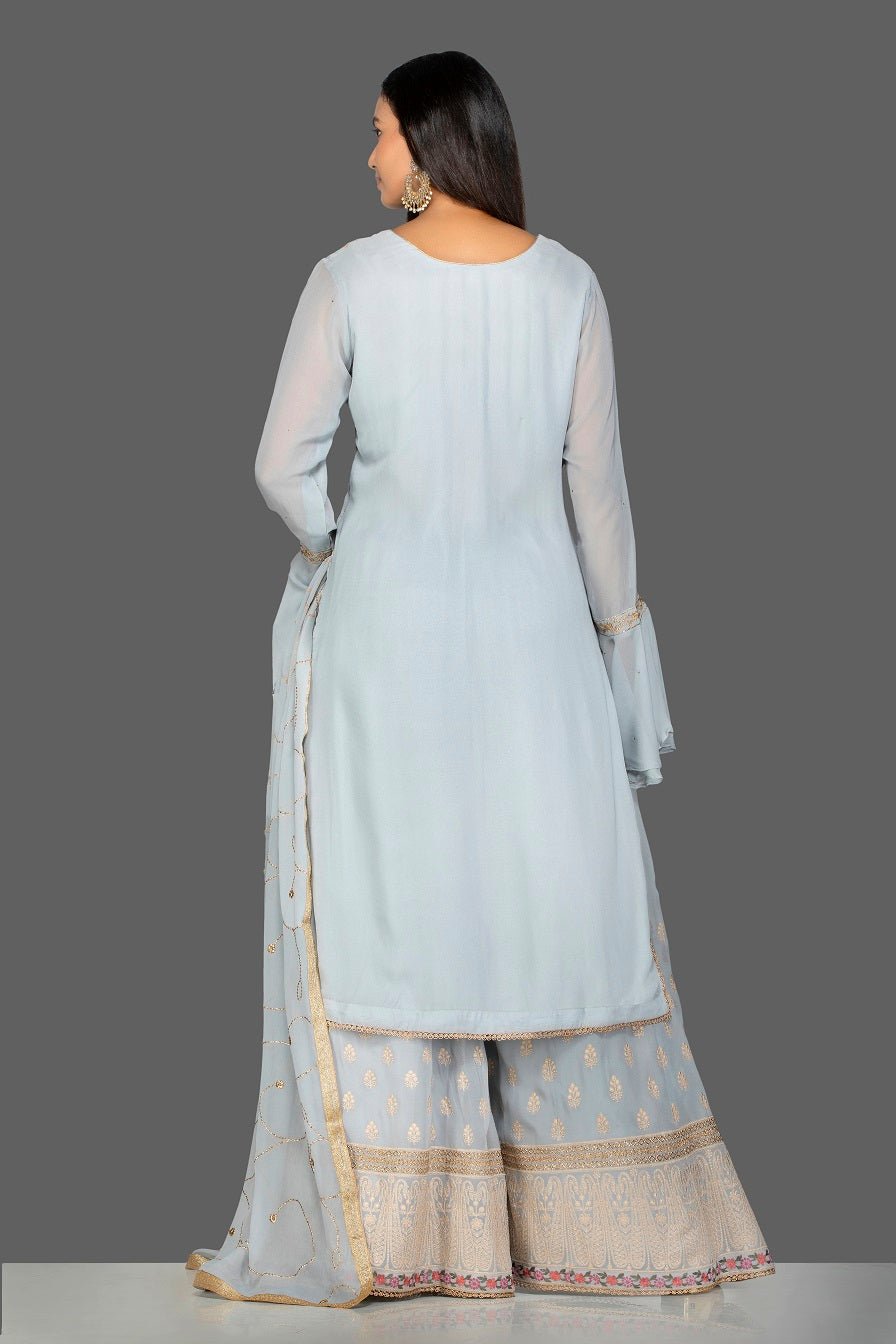 Buy powder blue embroidered georgette palazzo suit online in USA with dupatta. Turn heads at weddings and festive occasions with exquisite Indian women designer clothes from Pure Elegance Indian fashion store in USA. Shop now.-back