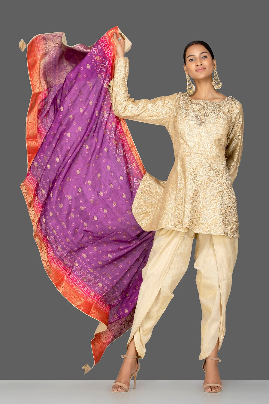 Buy cream embroidered brocade silk salwar suit online in USA with bandhej dupatta. Shop exquisite Indian designer clothes for women from Pure Elegance Indian boutique in USA. We have a splendid variety of designer Anarkali suits, traditional salwar suits, sharara suits  for parties and weddings all under one roof.-full view