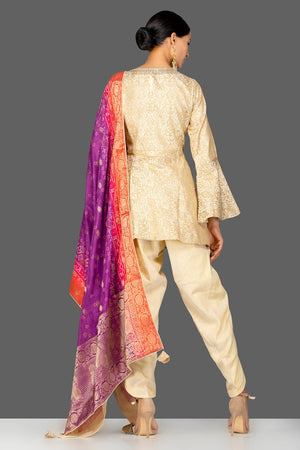 Buy cream embroidered brocade silk salwar suit online in USA with bandhej dupatta. Shop exquisite Indian designer clothes for women from Pure Elegance Indian boutique in USA. We have a splendid variety of designer Anarkali suits, traditional salwar suits, sharara suits  for parties and weddings all under one roof.-back