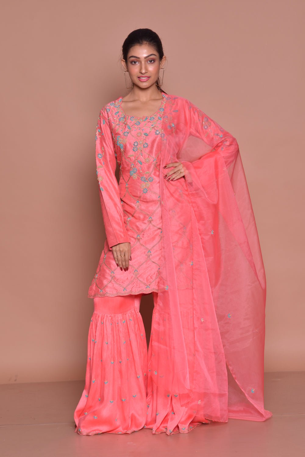 Shop elegant pink embroidered sharara suit online in USA with dupatta. Flaunt Indian fashion with exquisite designer suits, Anarkali suits, sharara suits from Pure Elegance Indian cloth store in USA. -full view