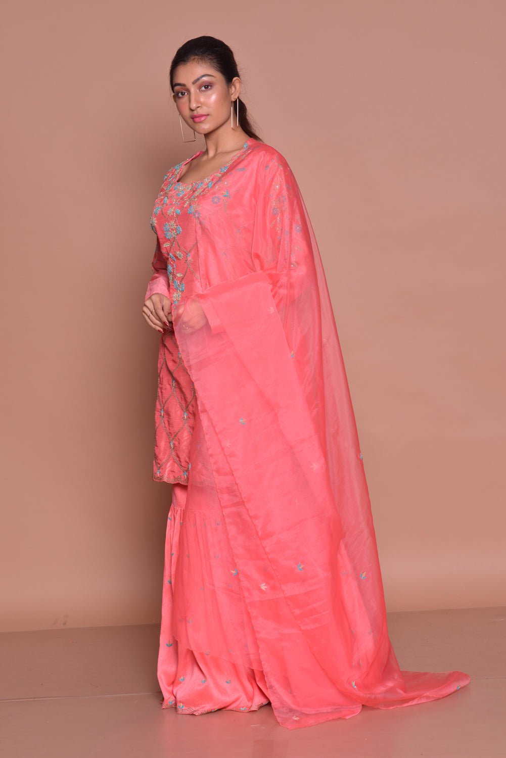Shop elegant pink embroidered sharara suit online in USA with dupatta. Flaunt Indian fashion with exquisite designer suits, Anarkali suits, sharara suits from Pure Elegance Indian cloth store in USA. -side