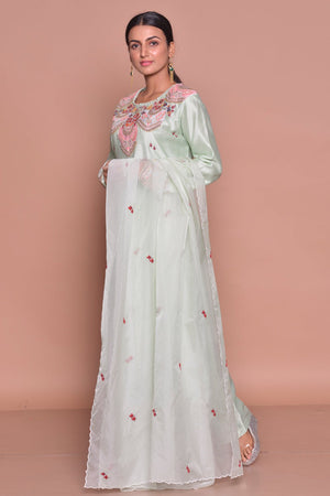 Shop elegant mint green embroidered suit online in USA with palazzo and dupatta. Flaunt Indian fashion with exquisite designer suits, Anarkali suits, sharara suits from Pure Elegance Indian cloth store in USA. -side