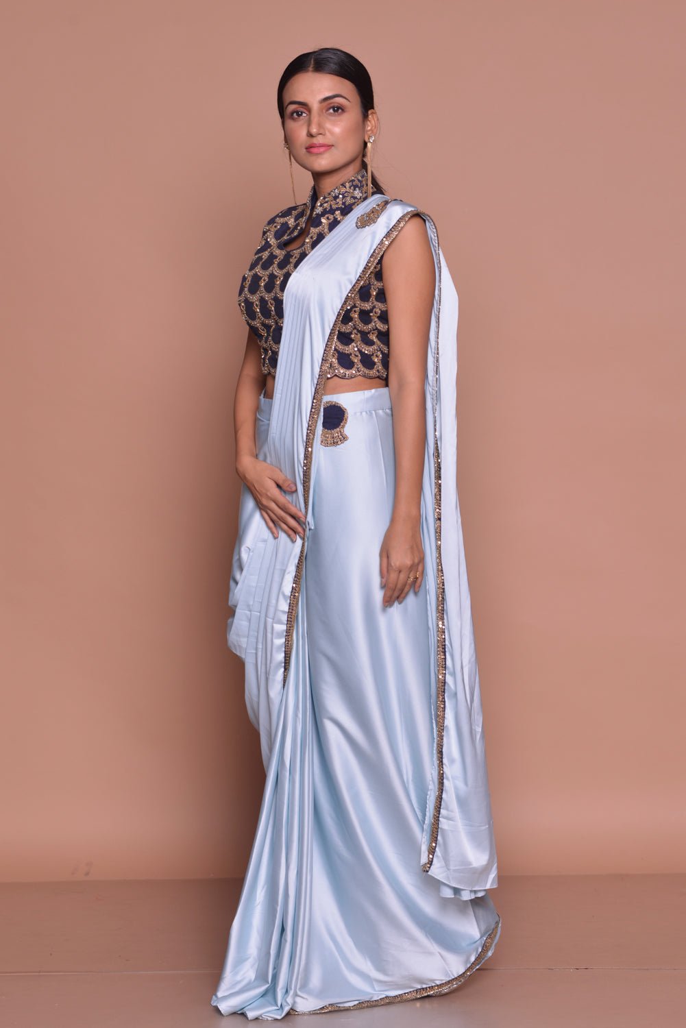 Buy light blue designer draped saree  online in USA with embroidered saree blouse. Flaunt Indian fashion with exquisite designer sarees, partywear sarees, bridal sarees from Pure Elegance Indian cloth store in USA. -side