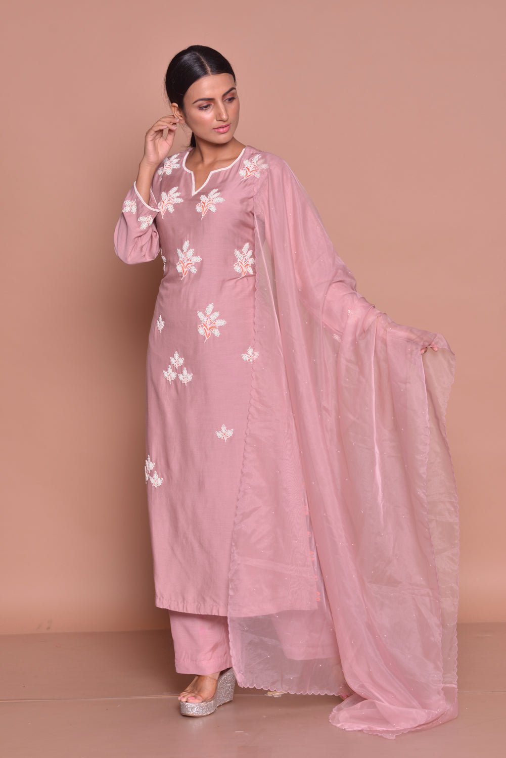 Buy champagne pink embroidered suit online in USA with embroidered saree blouse. Flaunt Indian fashion with exquisite designer suits, Anarkali dresses, traditional salwar suits from Pure Elegance Indian cloth store in USA. -front