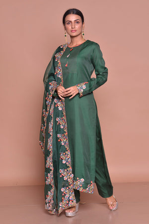 Shop beautiful dark green embroidered suit online in USA with palazzo and embroidered dupatta. Flaunt Indian fashion with exquisite designer suits, Anarkali dresses, traditional salwar suits from Pure Elegance Indian cloth store in USA. -side