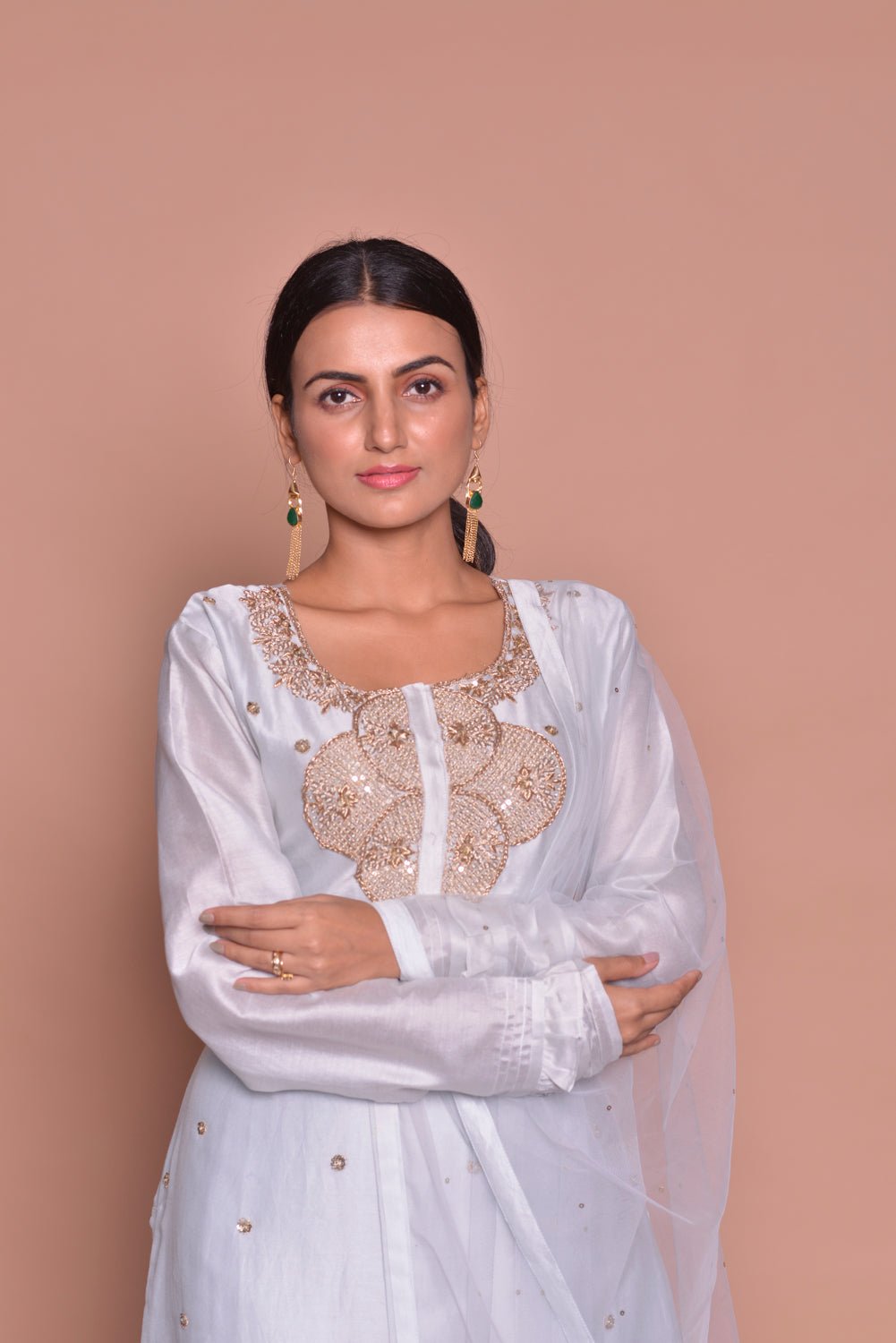 Shop stunning white embroidered kurta with skirt online in USA and dupatta. Flaunt Indian fashion with exquisite designer suits, Anarkali suits, sharara suits from Pure Elegance Indian cloth store in USA. -closeup