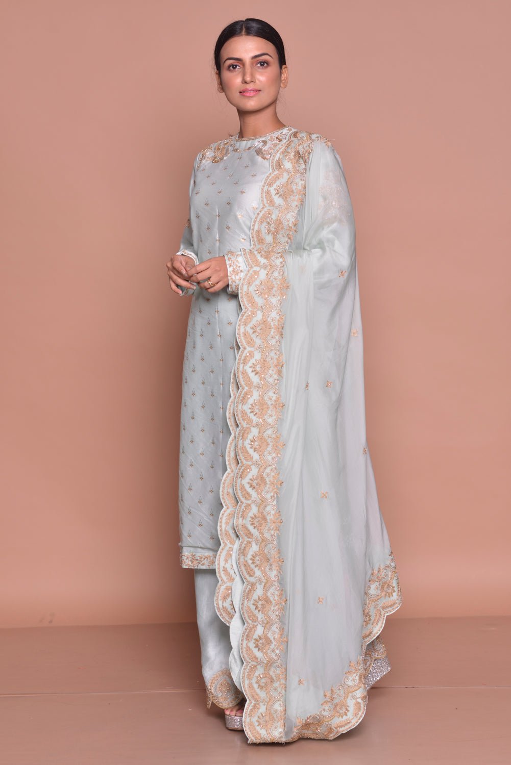 Buy gorgeous powder blue embroidered suit online in USA with embroidered palazzo and embroidered dupatta. Flaunt Indian fashion with exquisite designer suits, Anarkali dresses, traditional salwar suits from Pure Elegance Indian cloth store in USA. -side