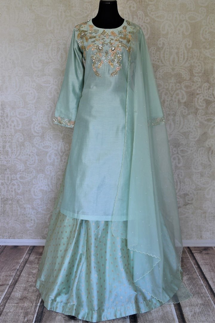 Buy beautiful tea green embroidered silk kurta with skirt online in USA and dupatta. Get spoiled for choices with a myriad of designer Indian dresses, wedding lehengas from Pure Elegance Indian fashion store in USA.-full view