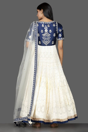 Buy beautiful off-white and blue Lucknowi work georgette Anarkali suit online in USA with dupatta. Spread ethnic elegance on weddings and special occasions in splendid designer lehengas, Anarkali suits crafted with exquisite Indian craftsmanship from Pure Elegance Indian fashion store in USA.-back