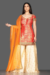 Shop beautiful red and cream embroidered net and Banarasi sharara suit online in USA with dupatta. Spread ethnic elegance on weddings and special occasions in splendid designer lehengas, Anarkali suits crafted with exquisite Indian craftsmanship from Pure Elegance Indian fashion store in USA.-full view