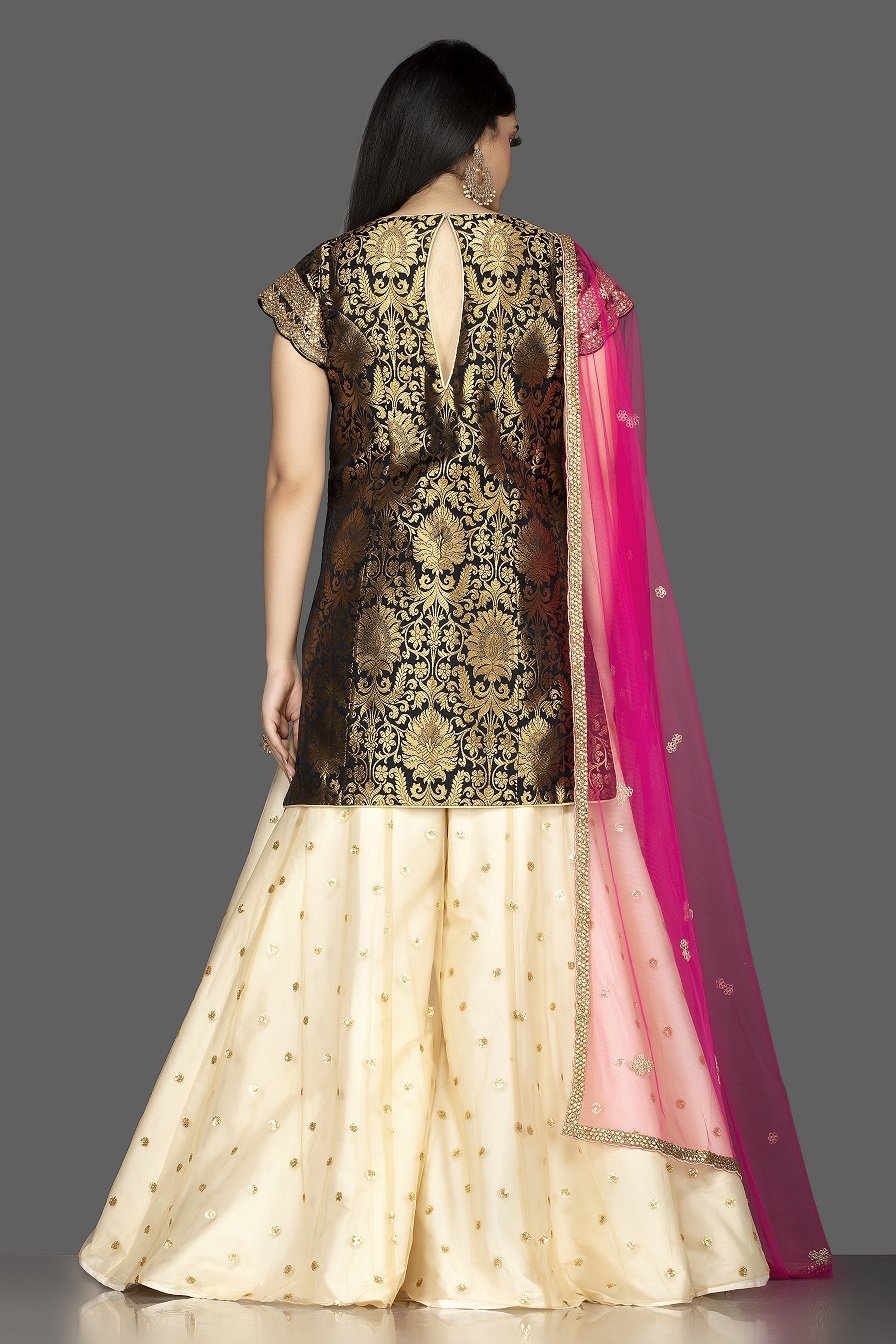 Buy gorgeous black and cream embroidered net and Banarasi sharara suit online in USA with pink dupatta. Spread ethnic elegance on weddings and special occasions in splendid designer lehengas, Anarkali suits crafted with exquisite Indian craftsmanship from Pure Elegance Indian fashion store in USA.-back
