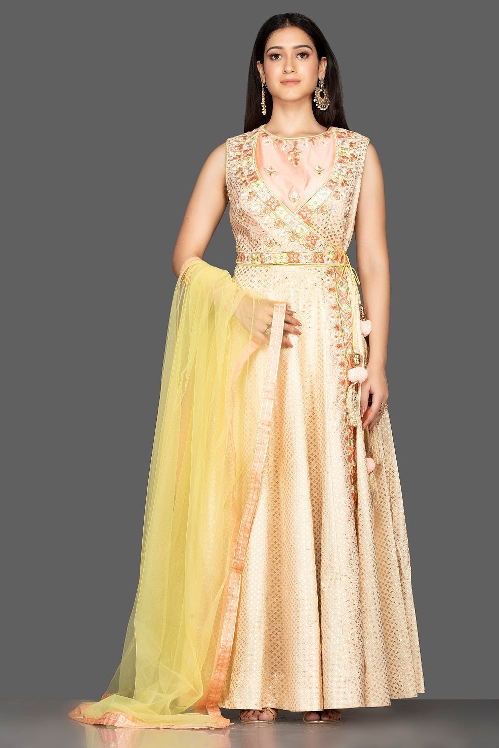 Buy beautiful cream embroidered Banarasi cotton Anarkali suit online in USA with yellow dupatta. Spread ethnic elegance on weddings and special occasions in splendid designer lehengas, Anarkali suits crafted with exquisite Indian craftsmanship from Pure Elegance Indian fashion store in USA.-full view