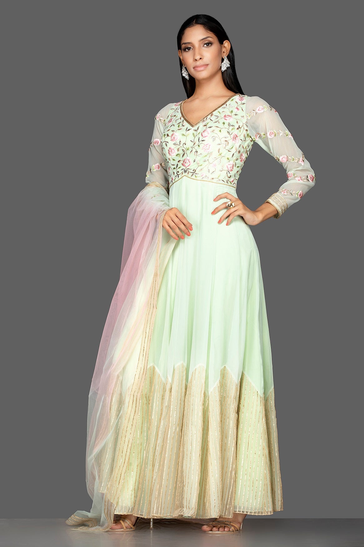 Buy mint green embroidered net floorlength Anarkali online in USA with dupatta. Spread ethnic elegance on weddings and special occasions in splendid designer lehengas, Anarkali suits crafted with exquisite Indian craftsmanship from Pure Elegance Indian fashion store in USA.-side
