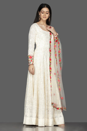 Shop elegant off-white georgette Lucknowi Anarkali online in USA with dupatta. Spread ethnic elegance on weddings and special occasions in splendid designer lehengas, Anarkali suits crafted with exquisite Indian craftsmanship from Pure Elegance Indian fashion store in USA.-side