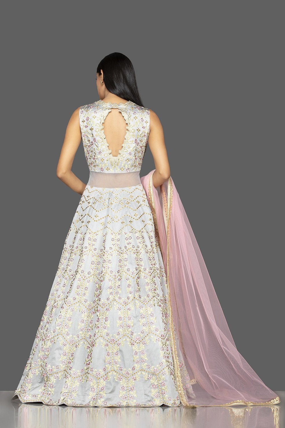 Buy stunning powder blue embroidered sheer Anarkali online in USA with pink dupatta. Look radiant on weddings and special occasions in splendid designer Indian dresses, wedding lehengas crafted with finest embroideries and stunning silhouettes from Pure Elegance Indian fashion boutique in USA.-back