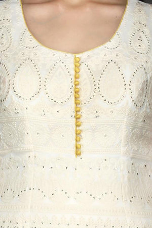 Shop white Lucknowi kurta online in USA with yellow georgette sharara. Flaunt ethnic fashion with exquisite designer lehenga, Indian wedding dresses, Anarkali suits from Pure Elegance Indian fashion boutique in USA.-top