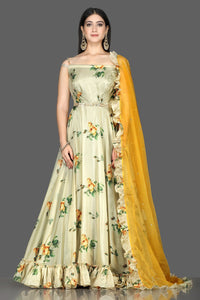 Shop lovely pista green floral organza silk Anarkali online in USA with a yellow ruffle dupatta. Go for an attractive wedding style with Pure Elegance designer lehengas. traditional salwar suits, Indowestern dresses available at our exclusive Indian fashion store in USA.-full view