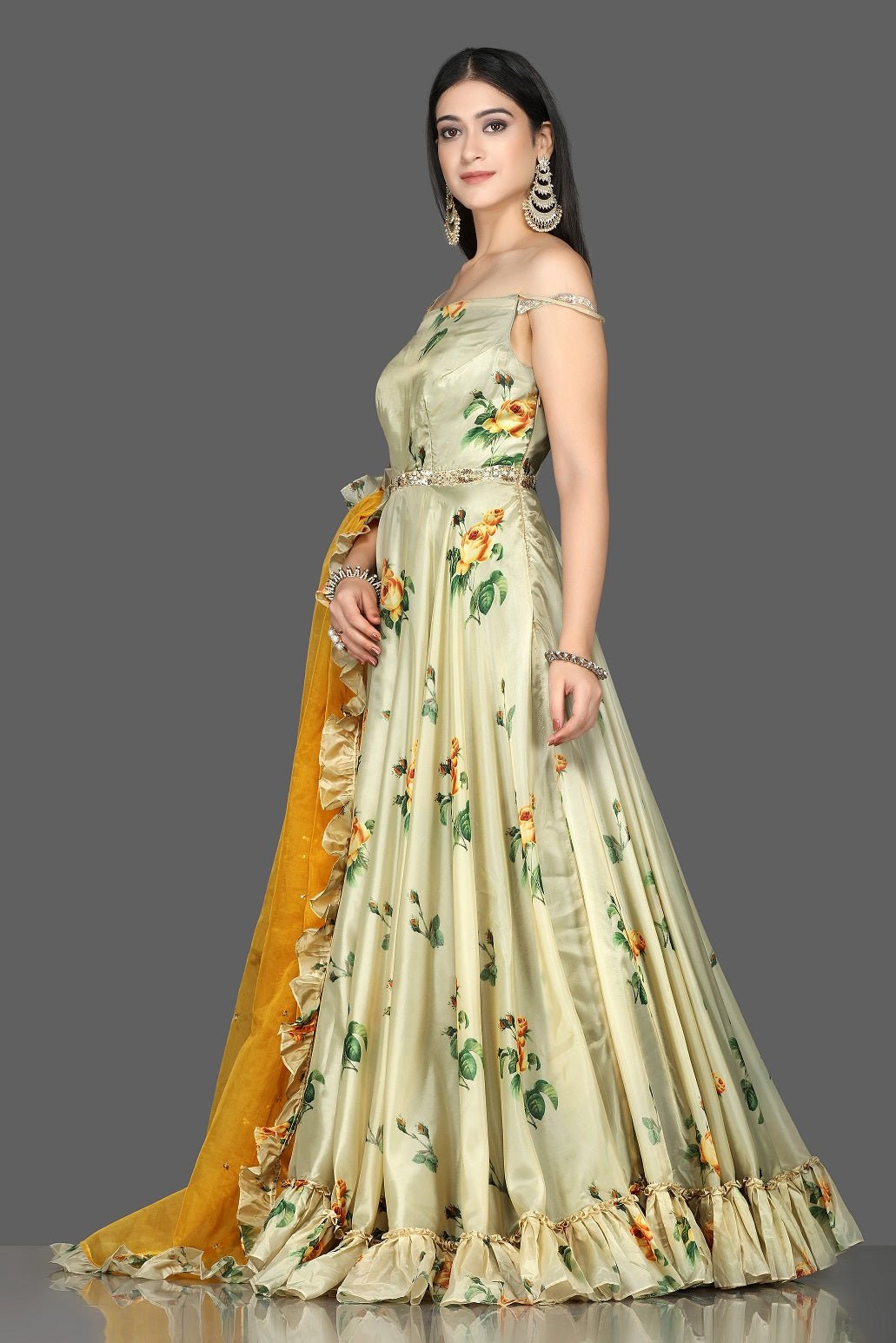 Shop lovely pista green floral organza silk Anarkali online in USA with a yellow ruffle dupatta. Go for an attractive wedding style with Pure Elegance designer lehengas. traditional salwar suits, Indowestern dresses available at our exclusive Indian fashion store in USA.-side