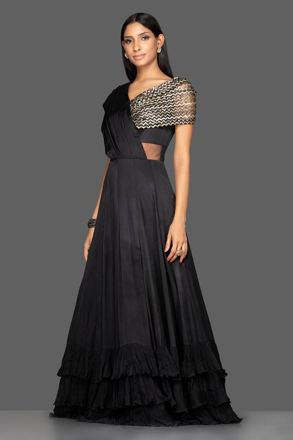 Shop stylish black embroidered georgette layered ruffle gown online in USA. Flaunt your extraordinary fashion sense with stunning Indian dresses, designer gowns from Pure Elegance Indian fashion store in USA.-side