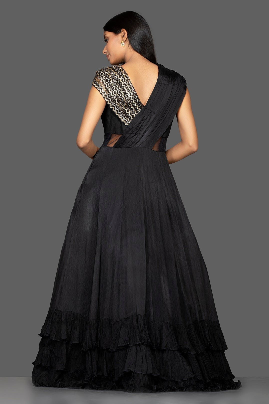 Shop stylish black embroidered georgette layered ruffle gown online in USA. Flaunt your extraordinary fashion sense with stunning Indian dresses, designer gowns from Pure Elegance Indian fashion store in USA.-back