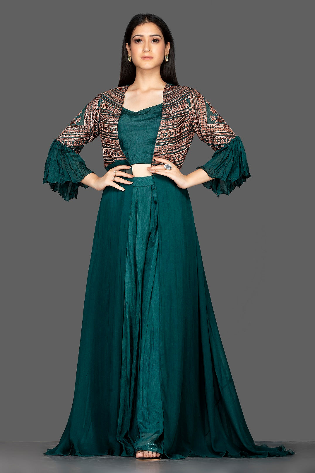 Buy stylish bottle green georgette crop top with palazzo online in USA and long shrug. Flaunt your extraordinary fashion sense with stunning Indian dresses, designer Anarkali suits from Pure Elegance Indian fashion store in USA.-full view