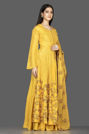 Shop attractive yellow embroidered chanderi silk Anarkali with dupatta online in USA. Flaunt your extraordinary fashion sense with stunning Indowestern dresses, designer Anarkali suits from Pure Elegance Indian fashion store in USA.-side
