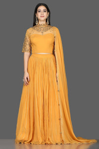 Shop beautiful mustard embroidered georgette lehenga online in USA with dupatta. Flaunt your extraordinary fashion sense with stunning Indian dresses, designer lehenga from Pure Elegance Indian fashion store in USA.-full view