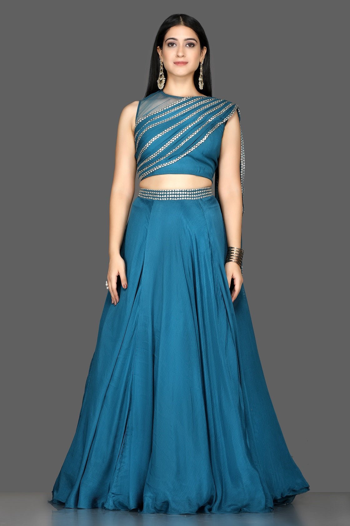 Buy blue embroidered silk lehenga online in USA with draped dupatta. Flaunt your extraordinary fashion sense with stunning Indian dresses, designer lehenga from Pure Elegance Indian fashion store in USA.-full view