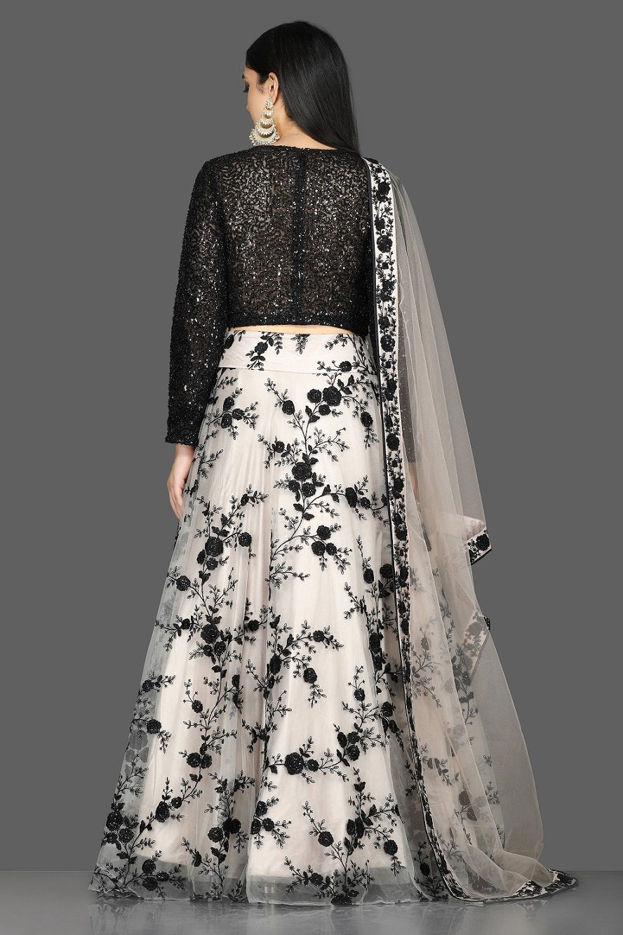 Shop stunning black sequin blouse with embroidered net skirt online in USA and dupatta. Flaunt your extraordinary fashion sense with stunning Indian dresses, designer lehenga from Pure Elegance Indian fashion store in USA.-back
