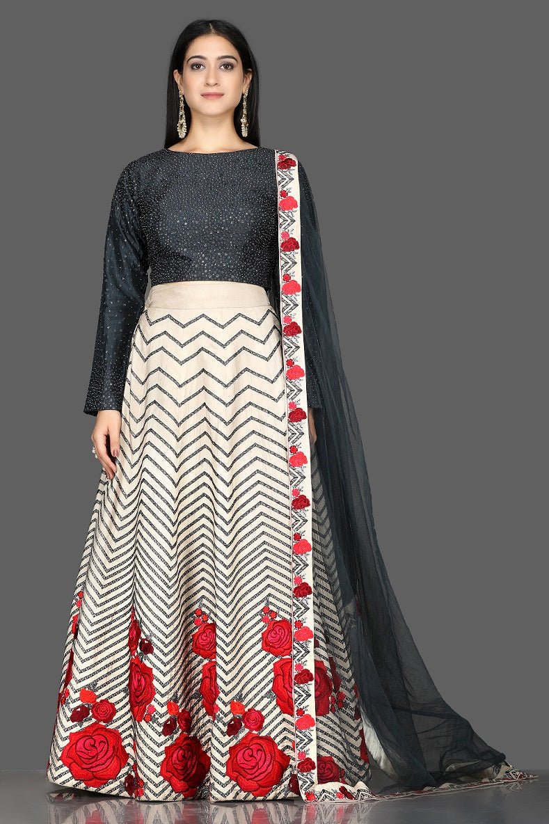 Shop ravishing black and cream sequin and applique silk lehenga online in USA with dupatta. Flaunt your extraordinary fashion sense with stunning Indian dresses, designer lehenga from Pure Elegance Indian fashion store in USA.-full view