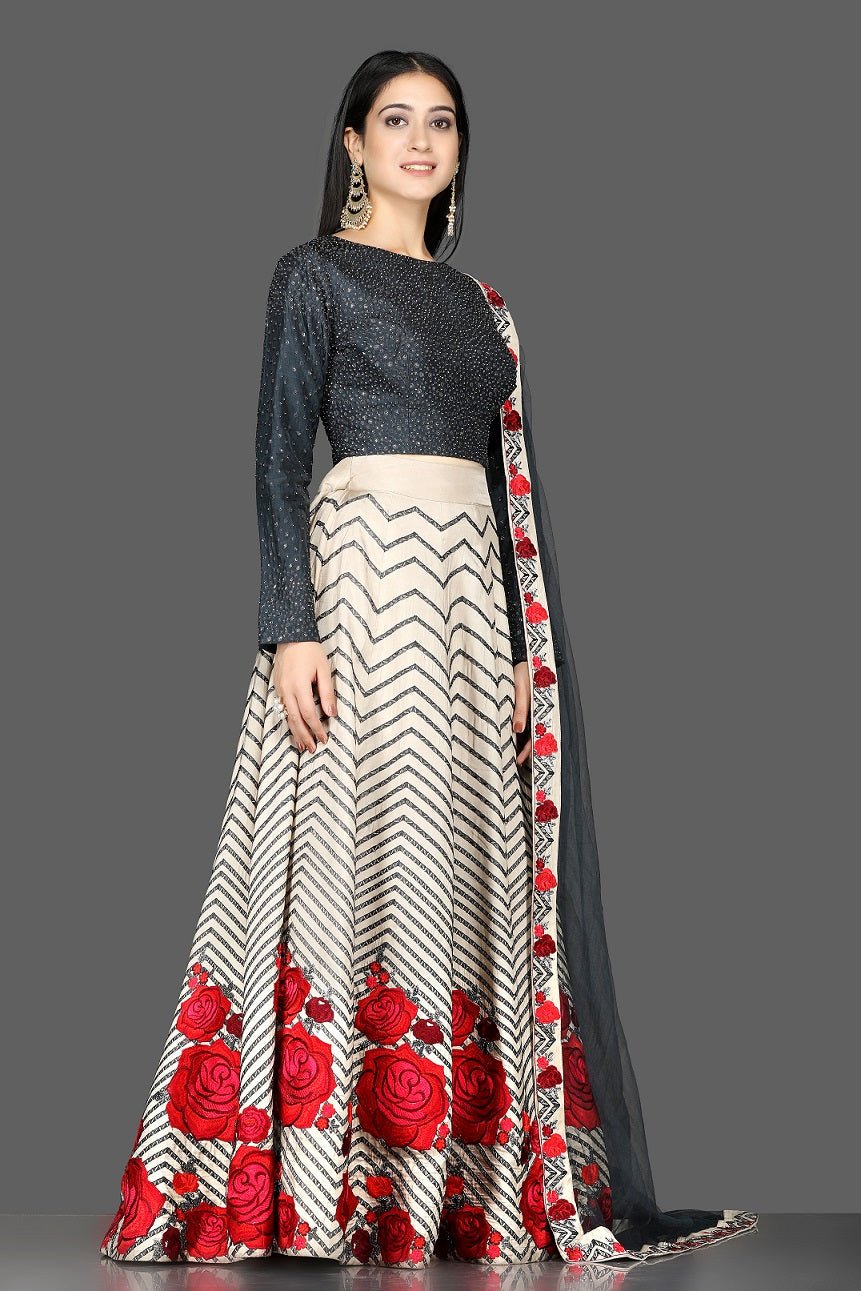 Shop ravishing black and cream sequin and applique silk lehenga online in USA with dupatta. Flaunt your extraordinary fashion sense with stunning Indian dresses, designer lehenga from Pure Elegance Indian fashion store in USA.-side