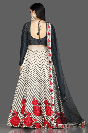 Shop ravishing black and cream sequin and applique silk lehenga online in USA with dupatta. Flaunt your extraordinary fashion sense with stunning Indian dresses, designer lehenga from Pure Elegance Indian fashion store in USA.-back