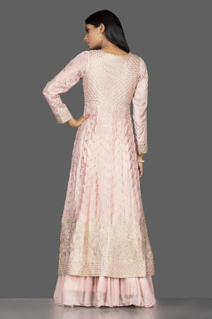 Buy powder pink top and skirt online in USA with embroidered long jacket. Flaunt your extraordinary fashion sense with stunning Indowestern dresses, designer Anarkali suits from Pure Elegance Indian fashion store in USA.-back