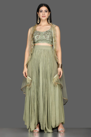 Buy olive green embroidered crop top with palazzo online in USA with faux feather cape. Shine at weddings and special occasions with beautiful designer Indian dresses, Anarkali suits from Pure Elegance Indian clothing store in USA.-full view