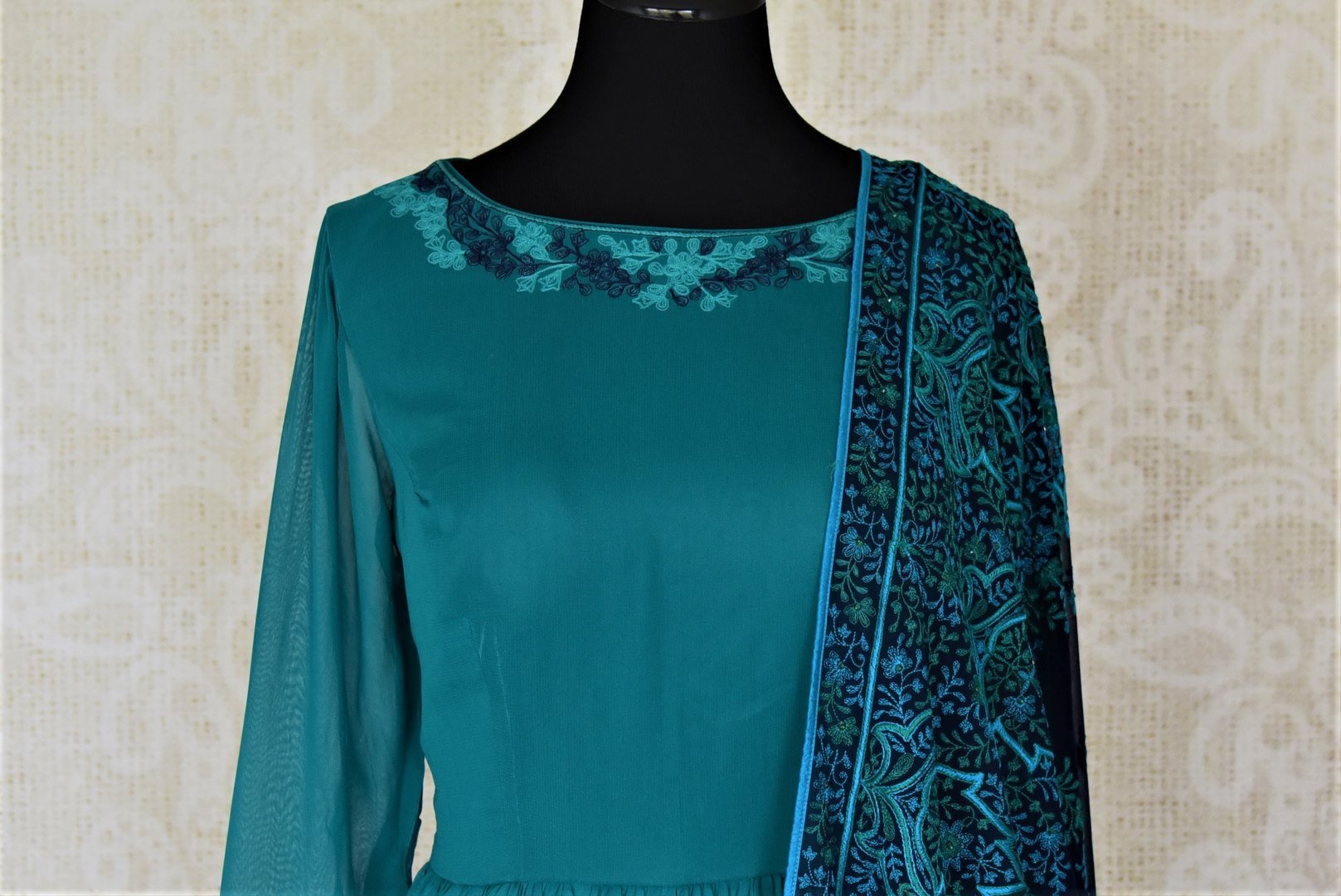 Shop gorgeous sea green embroidered georgette Anarkali online in USA with dupatta. Dazzle at weddings and festive occasions with stunning designer sharara and Anarkali suits from Pure Elegance Indian fashion store in USA.-top