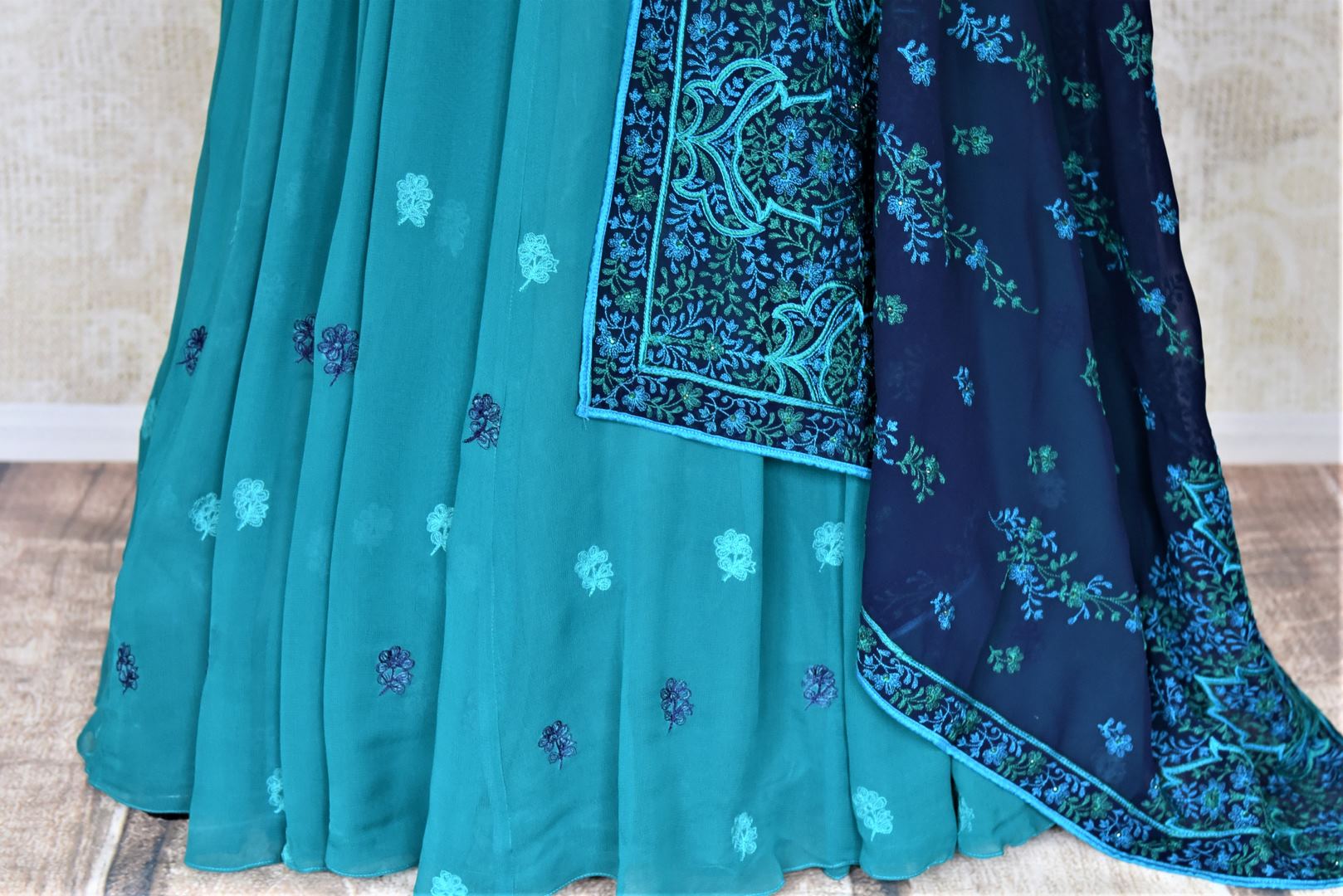Shop gorgeous sea green embroidered georgette Anarkali online in USA with dupatta. Dazzle at weddings and festive occasions with stunning designer sharara and Anarkali suits from Pure Elegance Indian fashion store in USA.-bottom