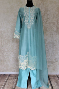 Buy alluring light blue pearl embroidery silk suit with palazzo online in USA and dupatta. Dazzle at weddings and festive occasions with stunning designer sharara and Anarkali suits from Pure Elegance Indian fashion store in USA.-full view