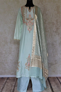 Shop exquisite mint green hand embroidery silk suit with palazzo online in USA and dupatta. Dazzle at weddings and festive occasions with stunning designer sharara and Anarkali suits from Pure Elegance Indian fashion store in USA.-full view