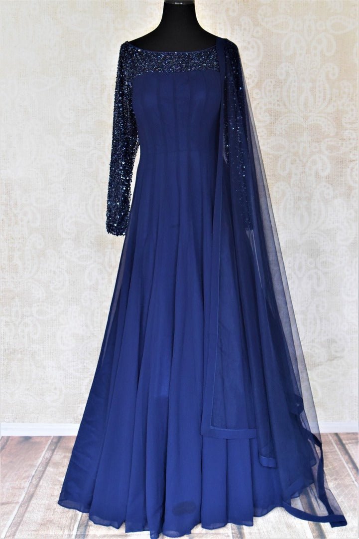 Shop contemporary dark blue hand embroidered georgette boat-neck Anarkali online in USA with dupatta. Dazzle at weddings and festive occasions with stunning designer sharara and Anarkali suits from Pure Elegance Indian fashion store in USA.-full view