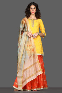 Buy bright yellow and red embroidered sharara suit online in USA with printed dupatta. Dazzle on weddings and special occasions with exquisite Indian designer dresses, sharara suits, Anarkali suits from Pure Elegance Indian fashion store in USA.-full view