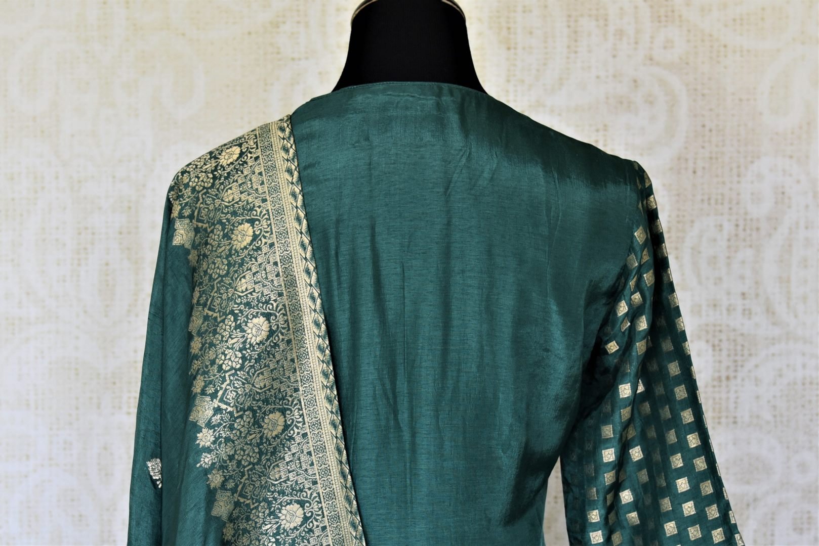 Shop dark green embroidered silk palazzo suit online in USA with dupatta. Elevate your ethnic style on weddings and festive occasions with stunning designer Anarkali suits, sharara suits, palazzo suits, salwar suits from Pure Elegance Indian fashion boutique in USA.-back