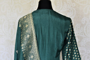 Shop dark green embroidered silk palazzo suit online in USA with dupatta. Elevate your ethnic style on weddings and festive occasions with stunning designer Anarkali suits, sharara suits, palazzo suits, salwar suits from Pure Elegance Indian fashion boutique in USA.-back
