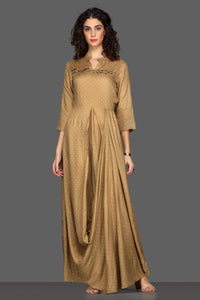 Buy elegant beige draped maxi dress online in USA. Dazzle on weddings and special occasions with exquisite Indian designer dresses, sharara suits, Anarkali suits from Pure Elegance Indian fashion store in USA.-full view