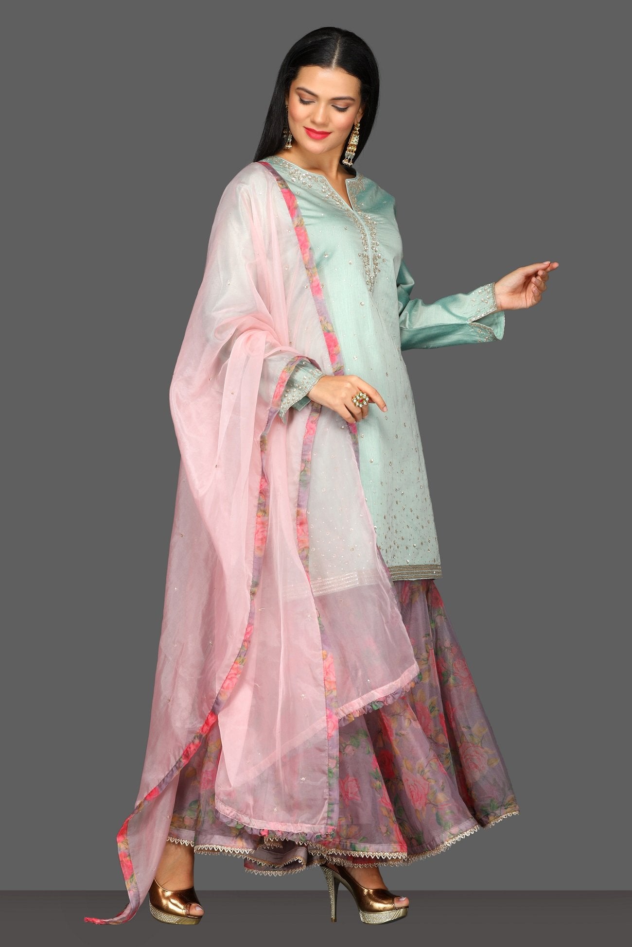 Shop beautiful mint green and floral pink embroidered sharara suit online in USA. Dazzle on weddings and special occasions with exquisite Indian designer dresses, sharara suits, Anarkali suits from Pure Elegance Indian fashion store in USA.-side