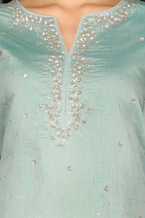 Shop beautiful mint green and floral pink embroidered sharara suit online in USA. Dazzle on weddings and special occasions with exquisite Indian designer dresses, sharara suits, Anarkali suits from Pure Elegance Indian fashion store in USA.-closeup