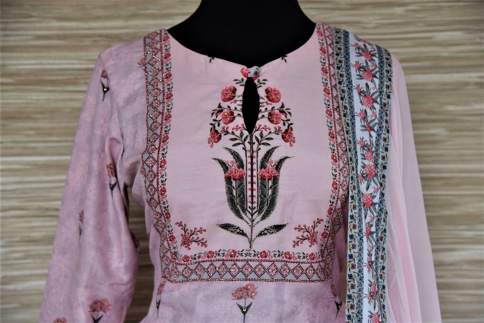 Buy stunning powder pink floral embroidered silk sharara suit online in USA with dupatta. Choose from a splendid variety of sharara suits, Anarkali suits, designer lehenga for weddings and festive occasions from Pure Elegance Indian clothing store in USA.-front